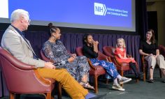 Dr. Michael Collins (far left) and Dr. Alison Boyce (far right) spoke with patient community members about their experiences with FD/MAS. 